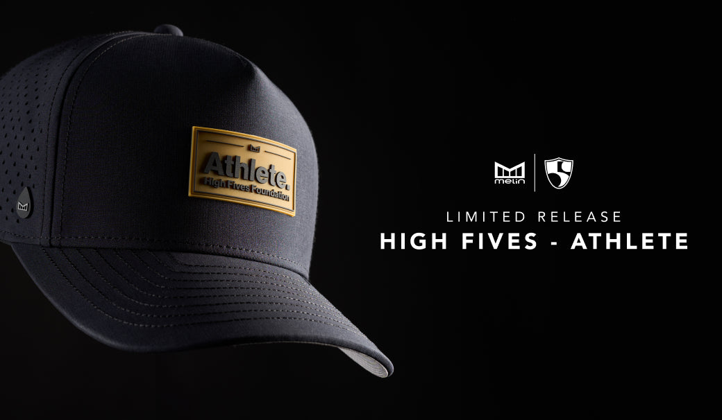The melin Odysea High Fives Hydro featuring a gold logo, labeled "Limited Release High Fives - Athlete," set against a dark background.