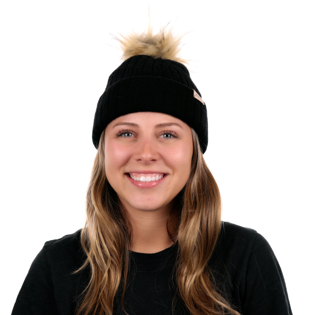 The model view of the Melin All-Day Pom Beanie in black Big Image - 2