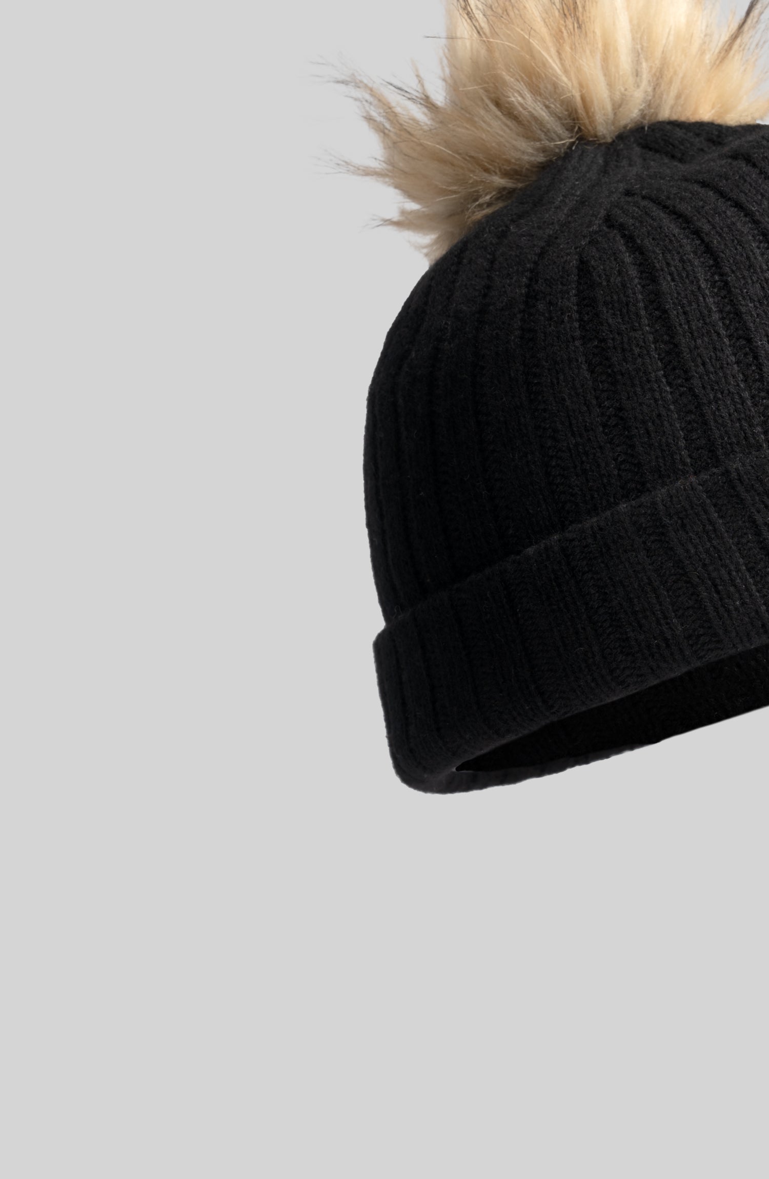 The feature grid item for the melin All Day Pom Beanie PDP Cards