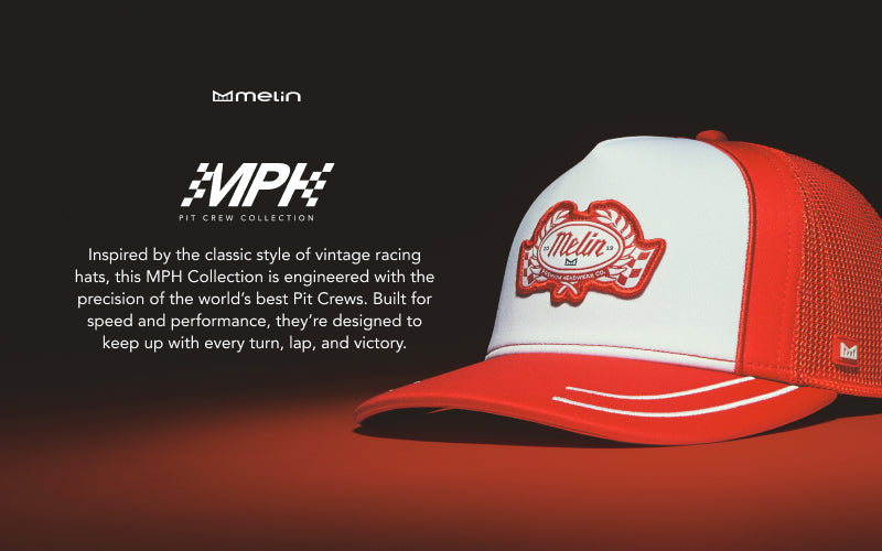 Red and white racing cap with 'MPH' branding on a dark background