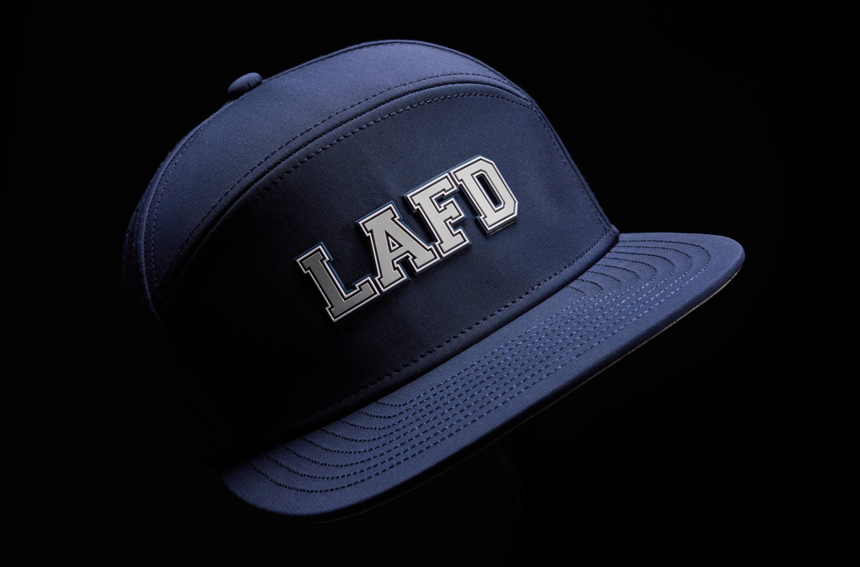The melin Trenches Hydro in Navy with 'LAFD' logo on a black background