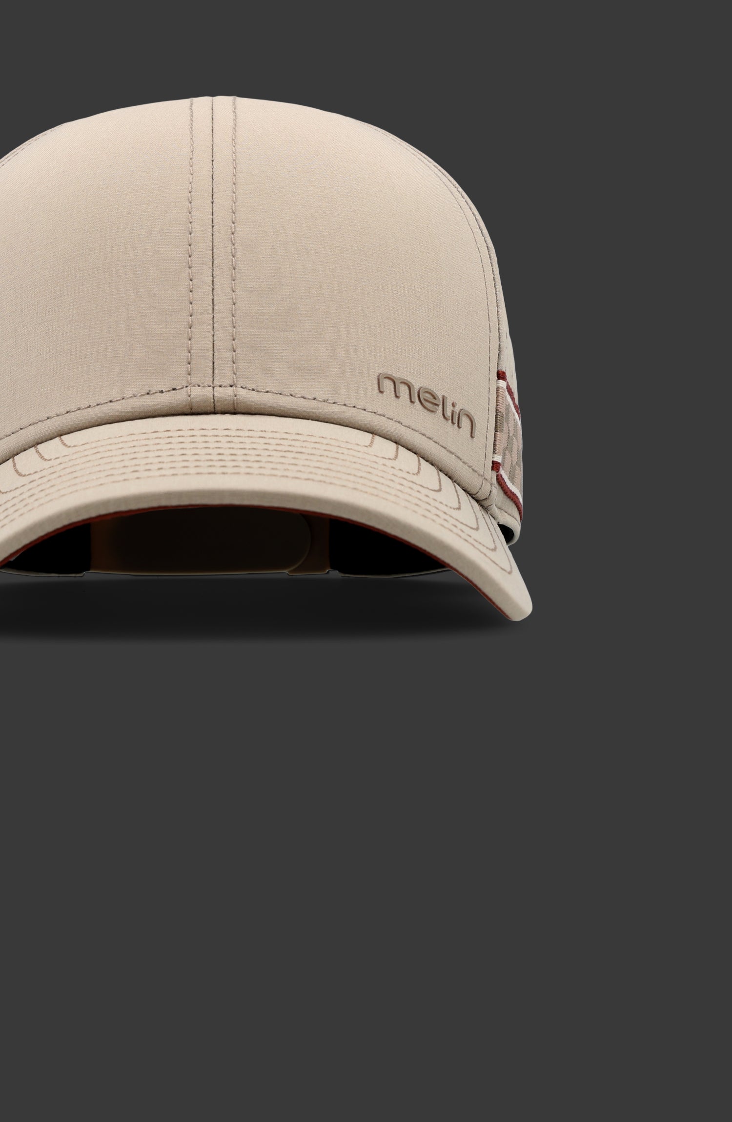 A feature card image for the melin Compass Links Hydro hat in cobblestone (Materials)