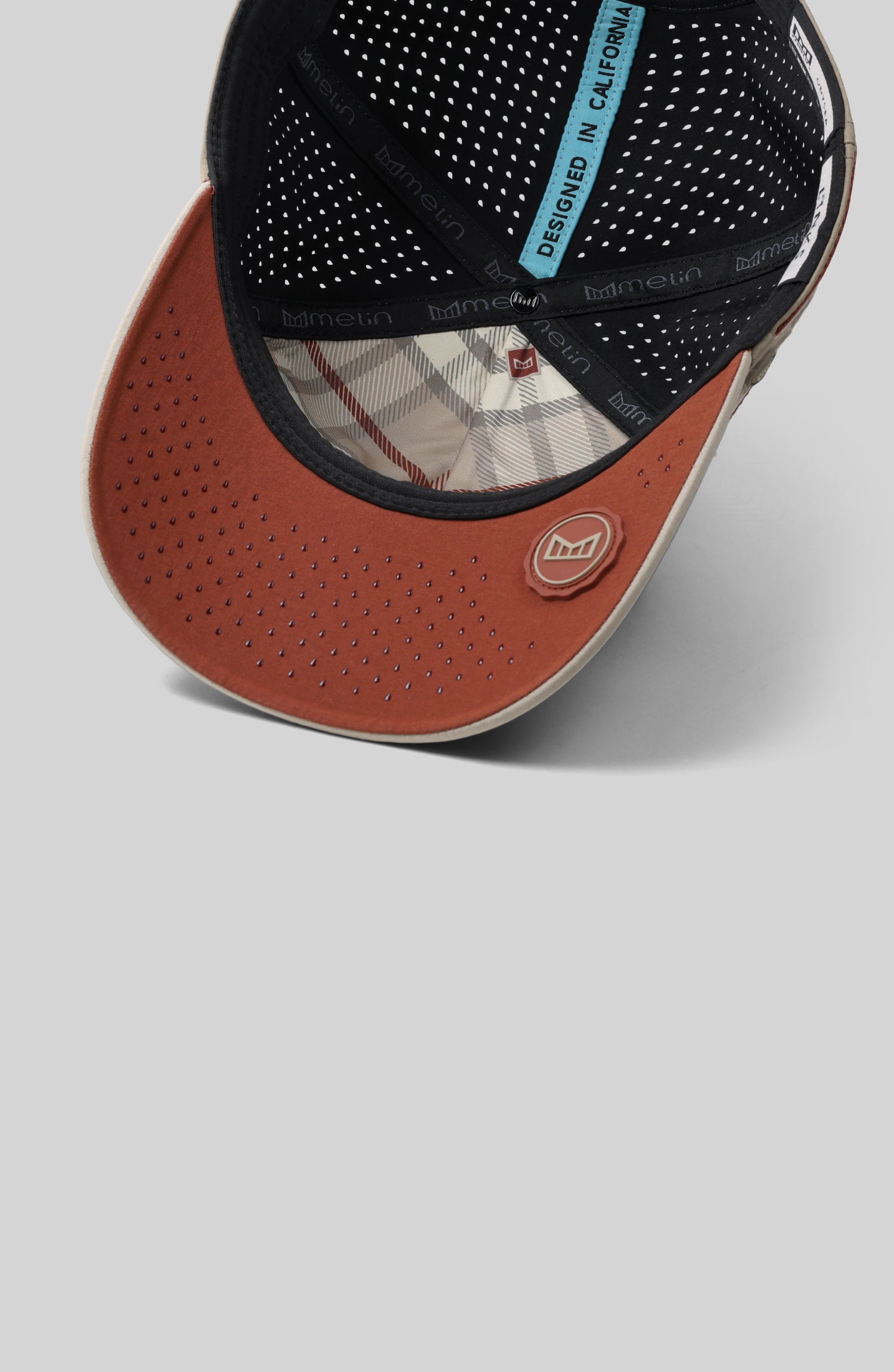 A feature card image for the melin Odysea Links Hydro hat in cobblestone (Details)