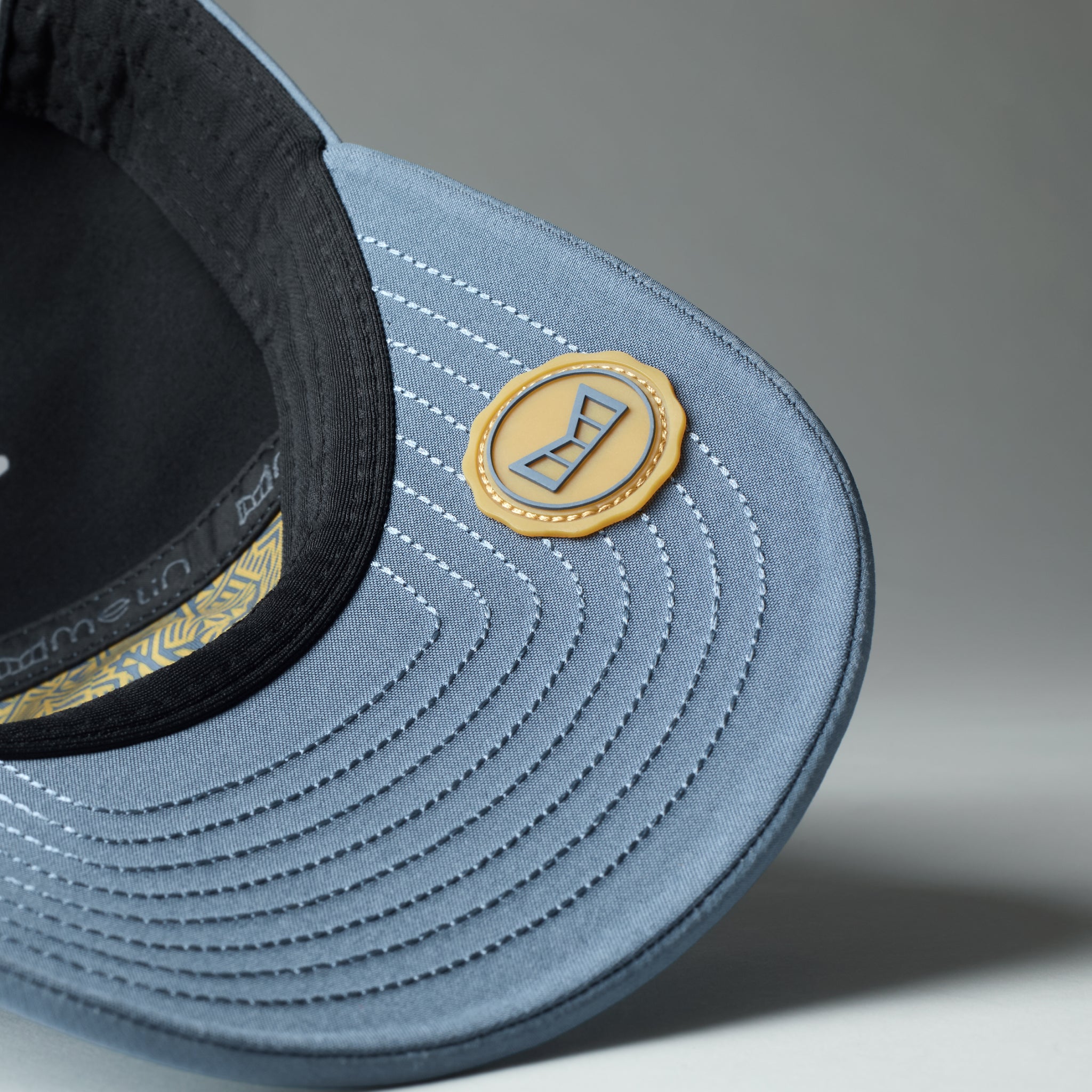 melin Legend Hydro Blue Stone Gum dad hat