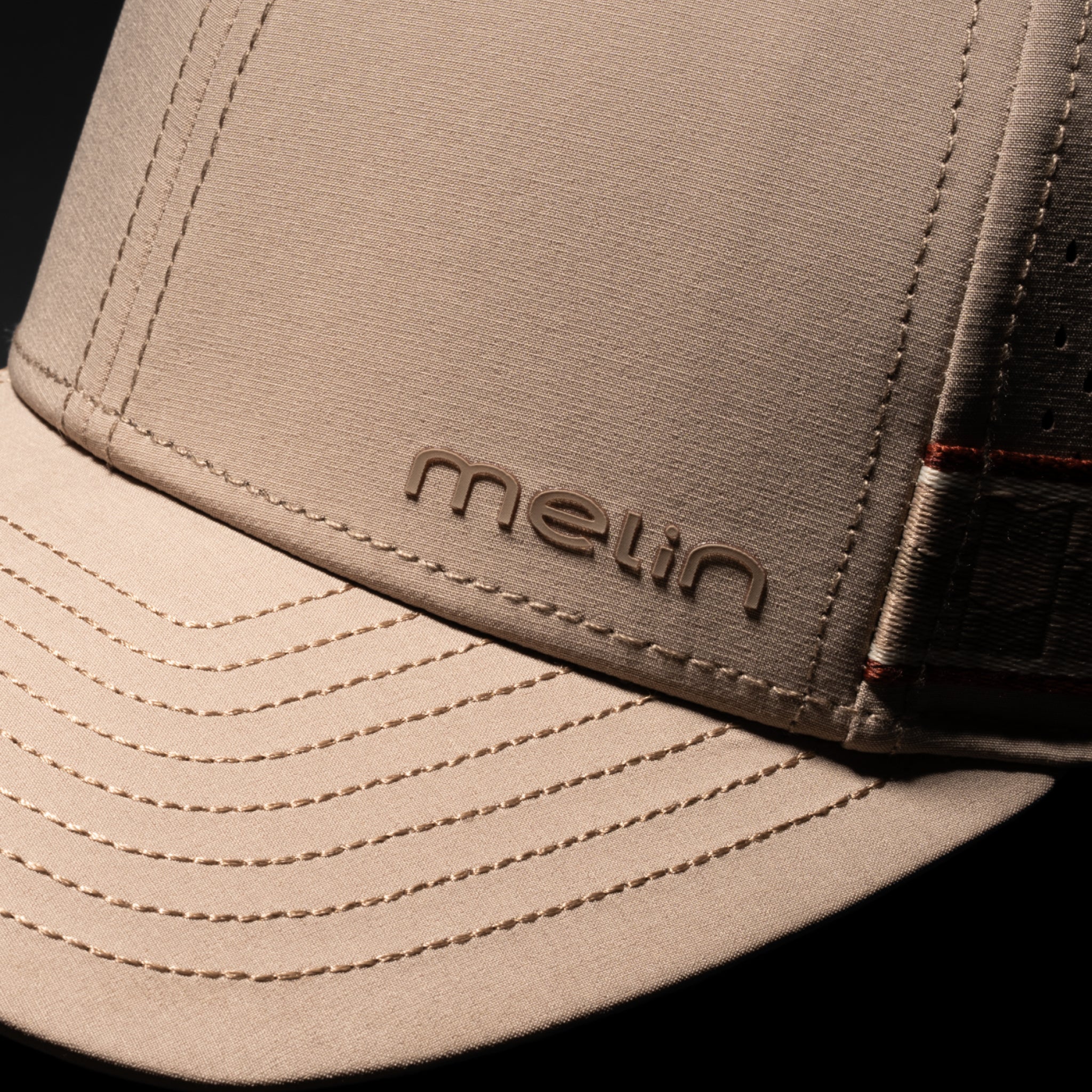 A gallery image of the melin Compass Links Hydro hat in cobblestone, 3 of 5
