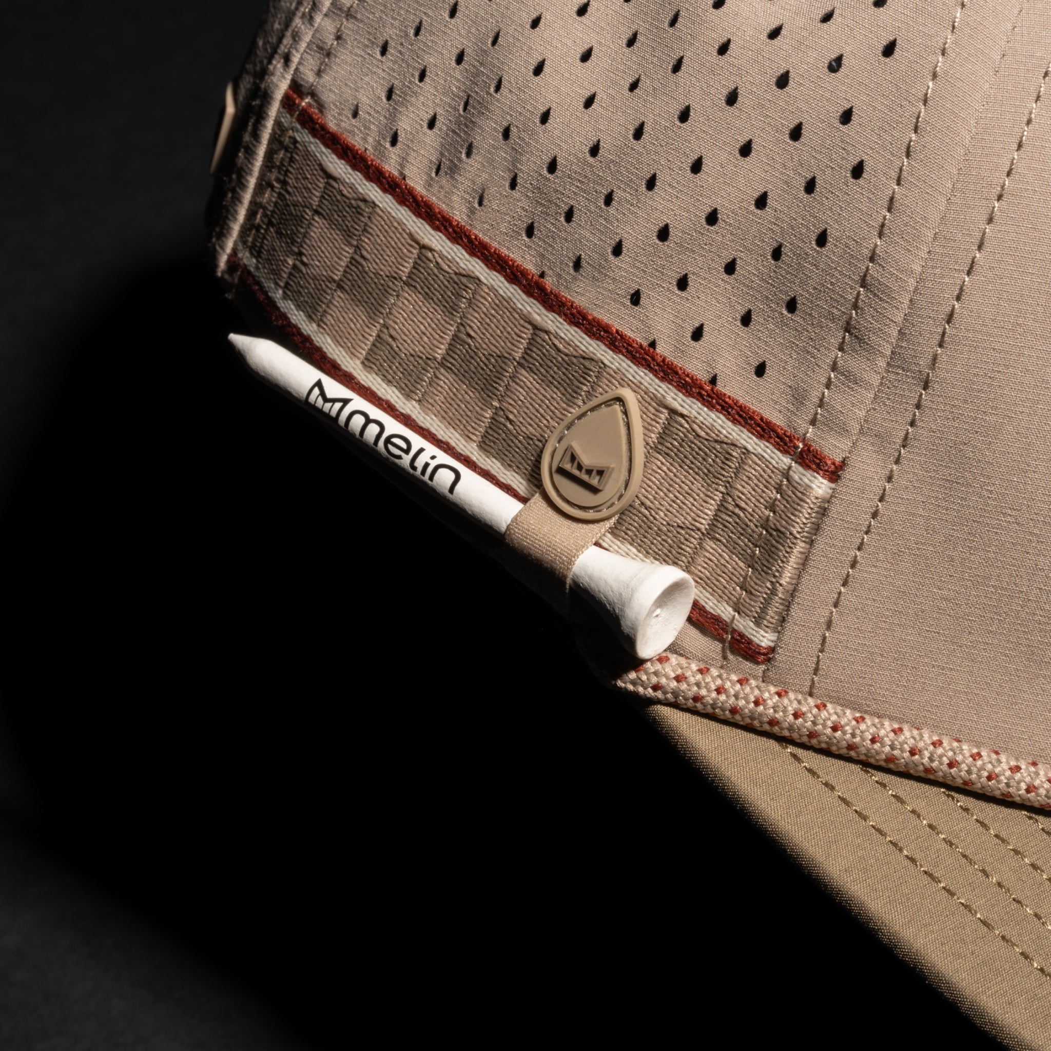 A gallery image of the melin Coronado Links Hydro hat in cobblestone, 2 of 5
