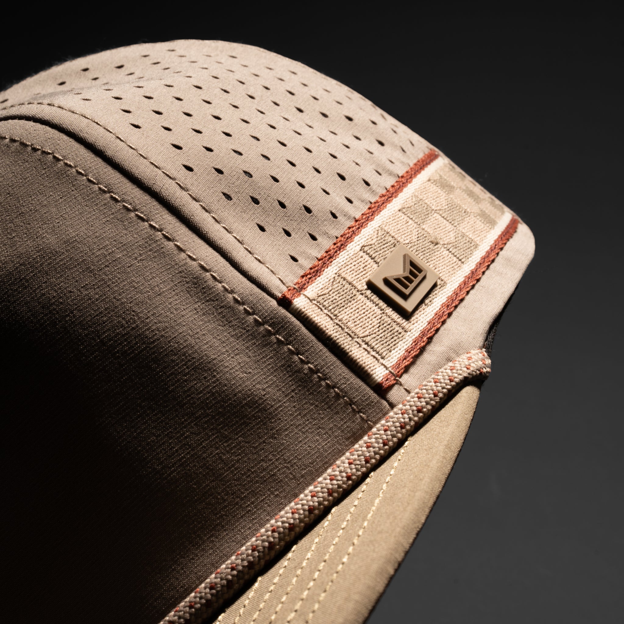 A gallery image of the melin Coronado Links Hydro hat in cobblestone, 4 of 5