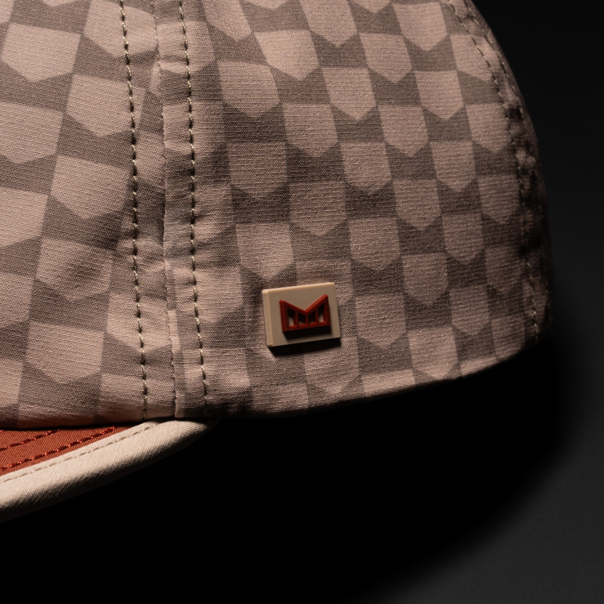A gallery image of the melin Eagle Links Hydro hat in cobblestone, 4 of 5
