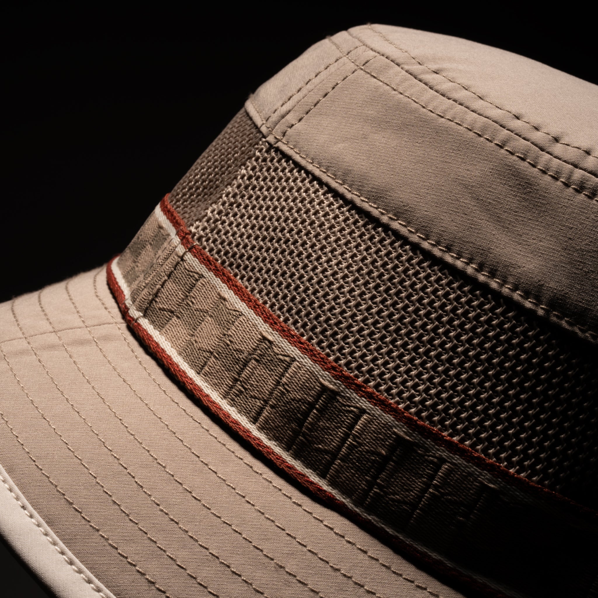 A gallery image of the melin Caddy Links Hydro hat in cobblestone, 4 of 5