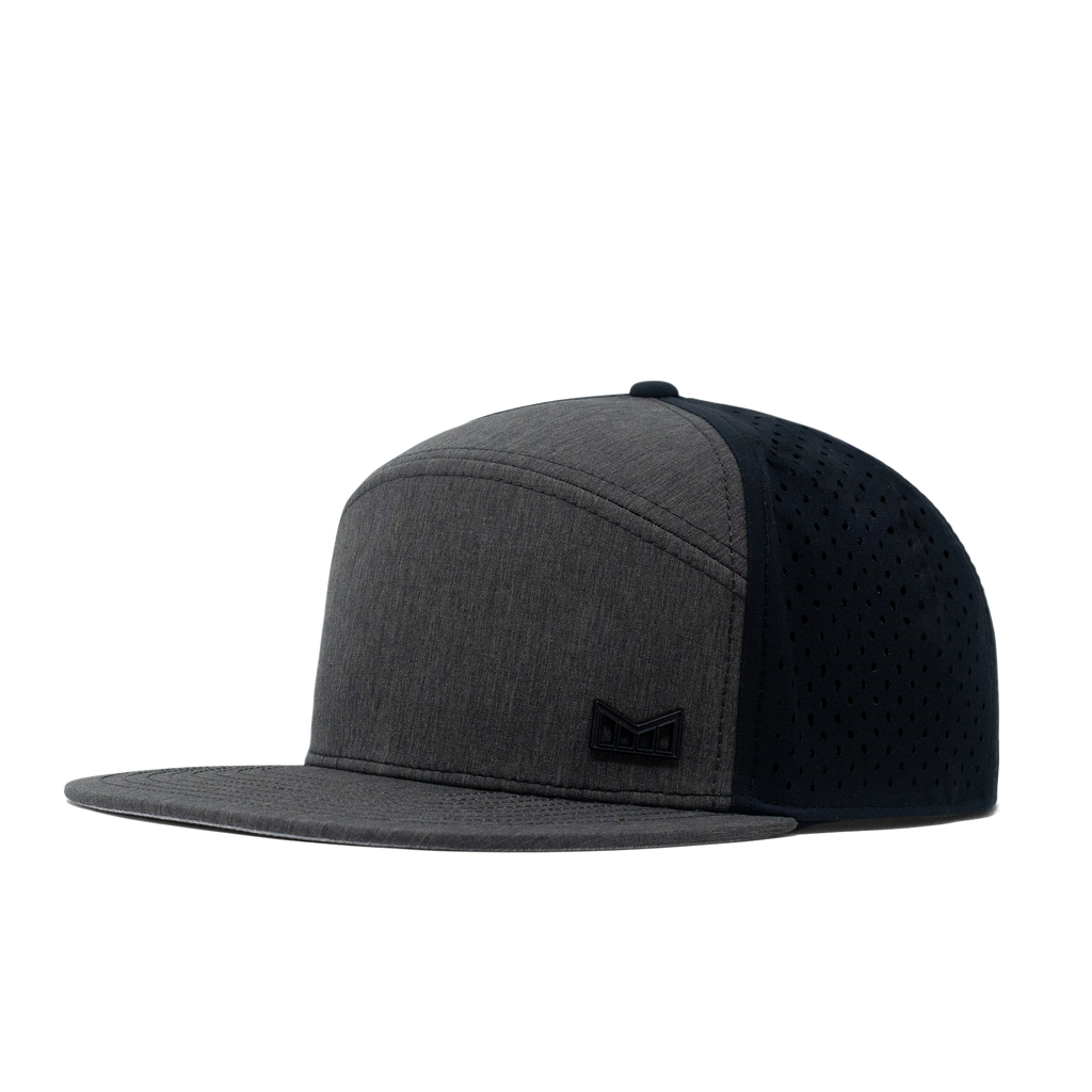 The angled view of the Melin Horizon Fit Trenches Icon Hydro hat in black Big Image - 1