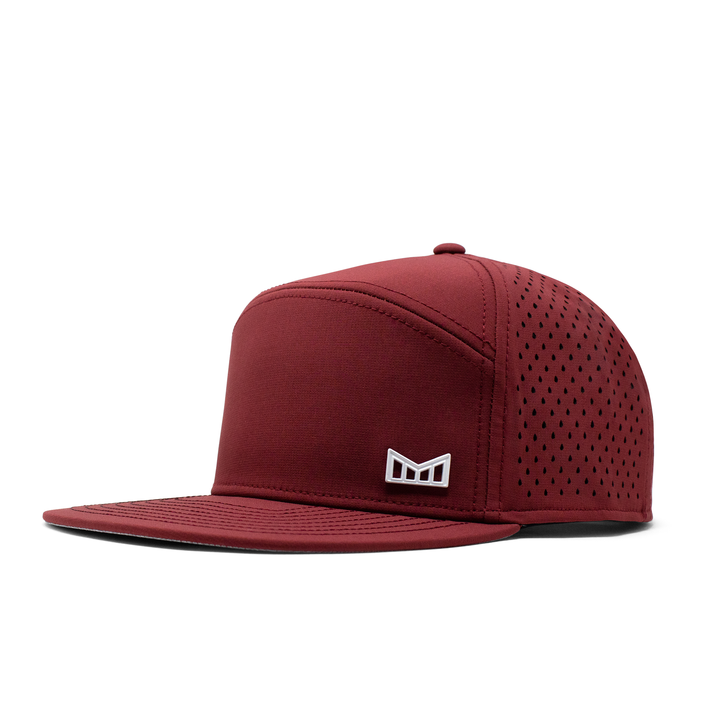 The angled view of the Melin Horizon Fit Trenches Icon Hydro hat in maroon