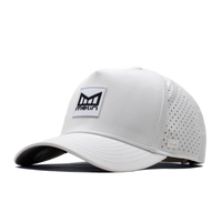 The angled view of the Melin Split Fit Odyssey Stacked Hydro hat in white
