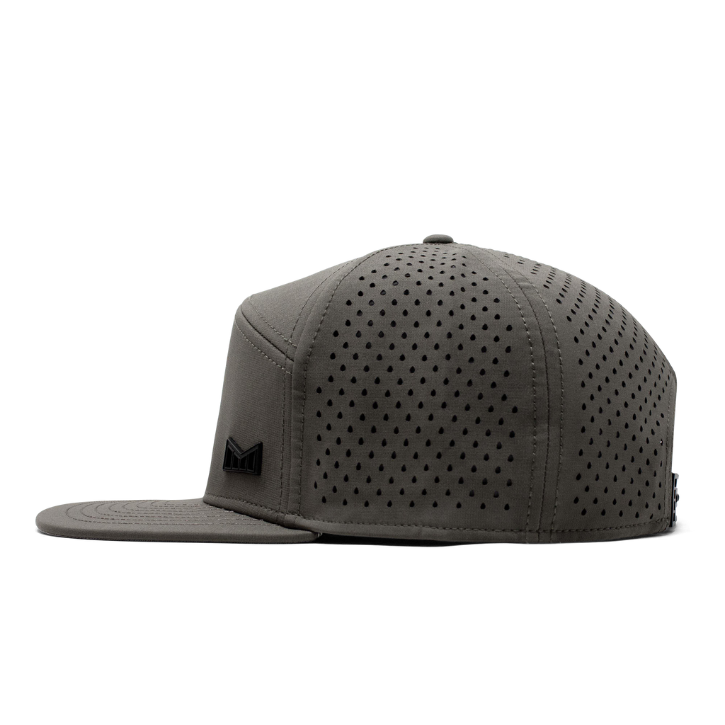 The side view of the Melin Horizon Fit Trenches Icon Hydro hat in green Big Image - 4