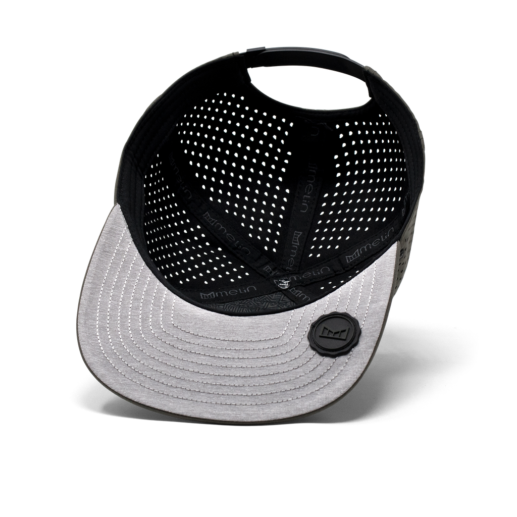 The inside view of the Melin Horizon Fit Trenches Icon Hydro hat in green Big Image - 5