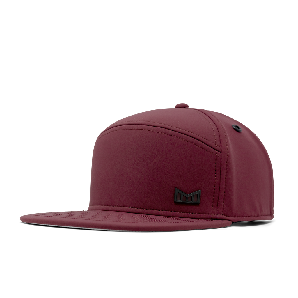 The front, angled view of melin's Trenches Icon Infinite Thermal snapback hat in Maroon. Big Image - 1
