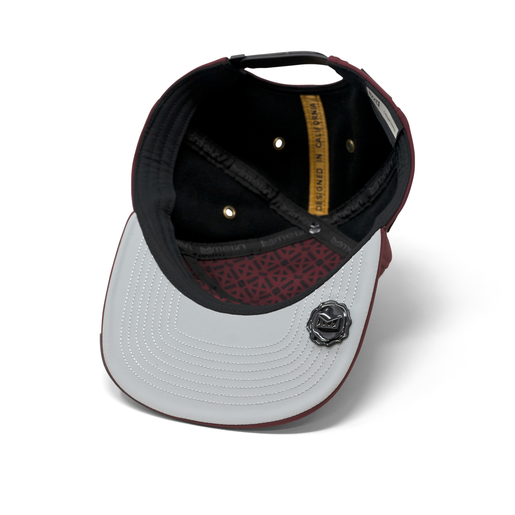 The inside view of melin's Trenches Icon Infinite Thermal snapback hat in Maroon. Big Image - 5