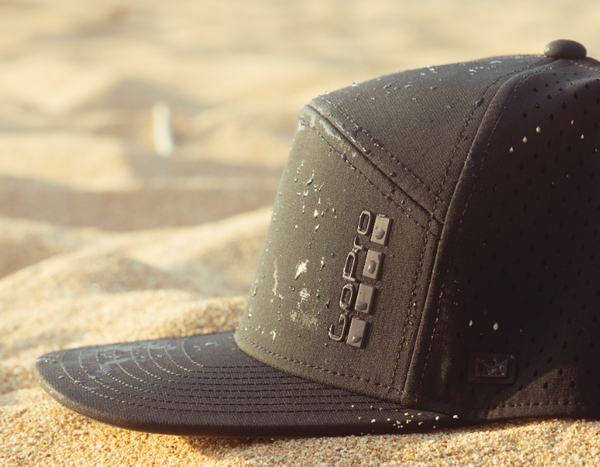 Go Pro x melin hat on beach